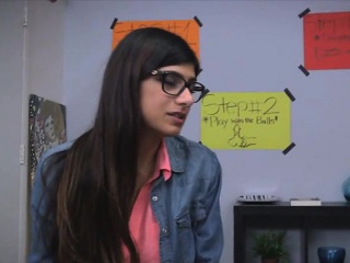 Cutie Mia Khalifa with a huge cock in her mouth